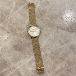 Women’s COACH Perry Gold-tone bracelet watch.